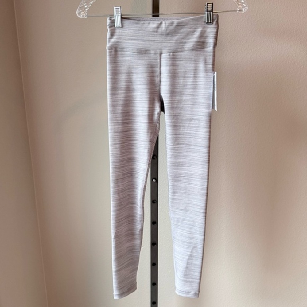 NWT Athleta Girl High Rise Chit Chat Tight
Size medium 8/10